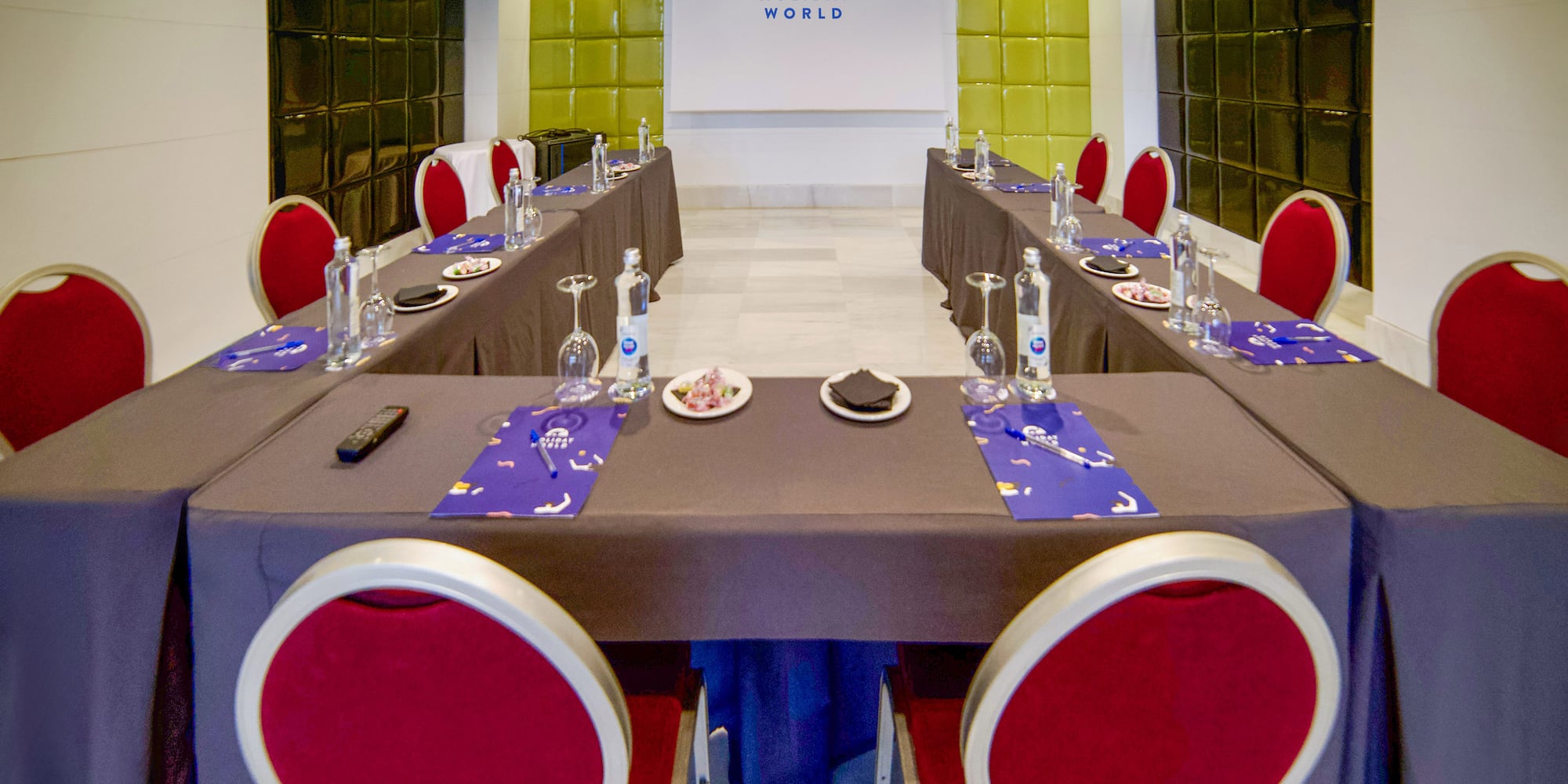 a long table set for a meeting