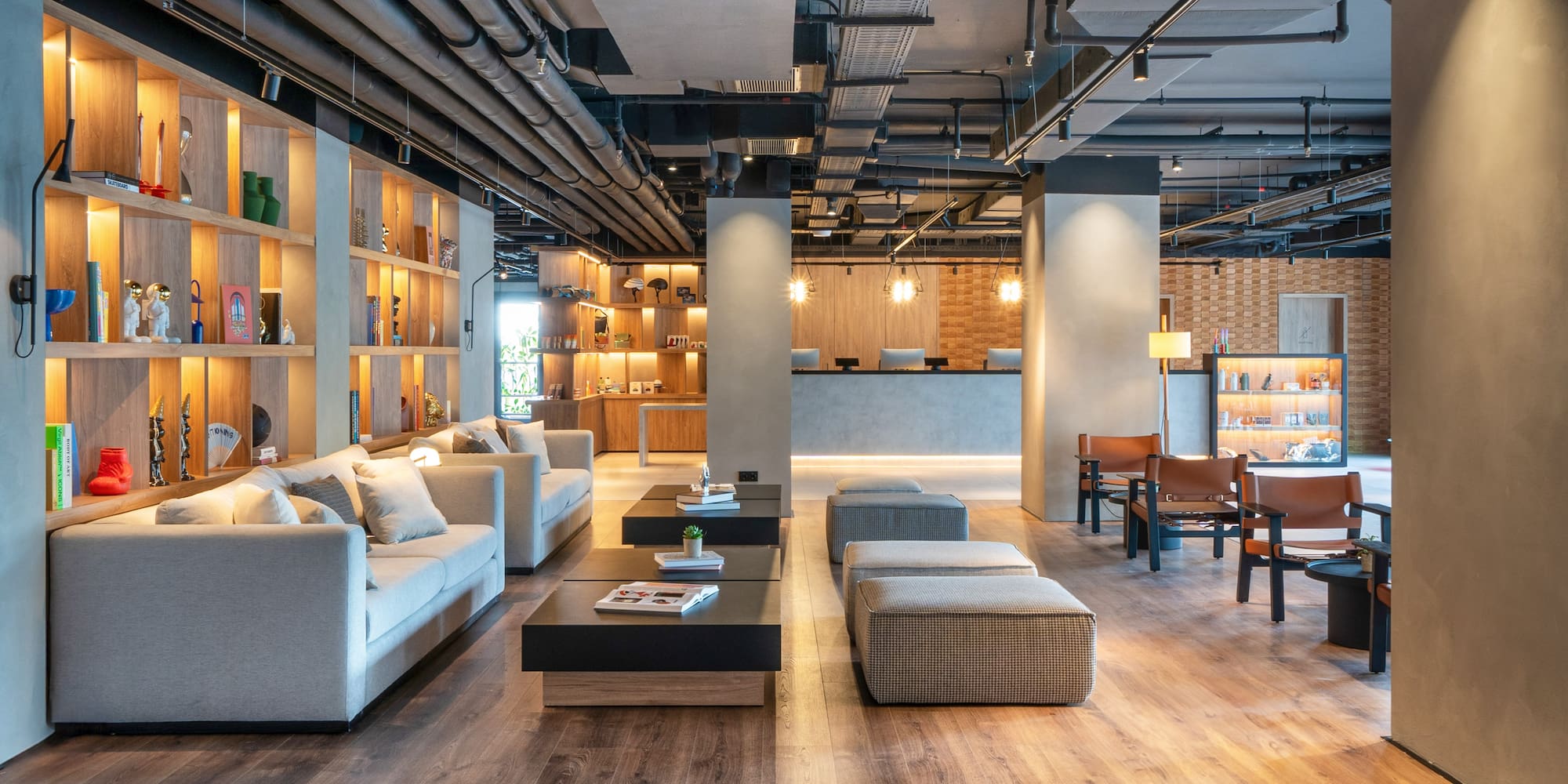 a room with couches and tables