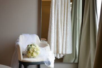a wedding dress and a chair