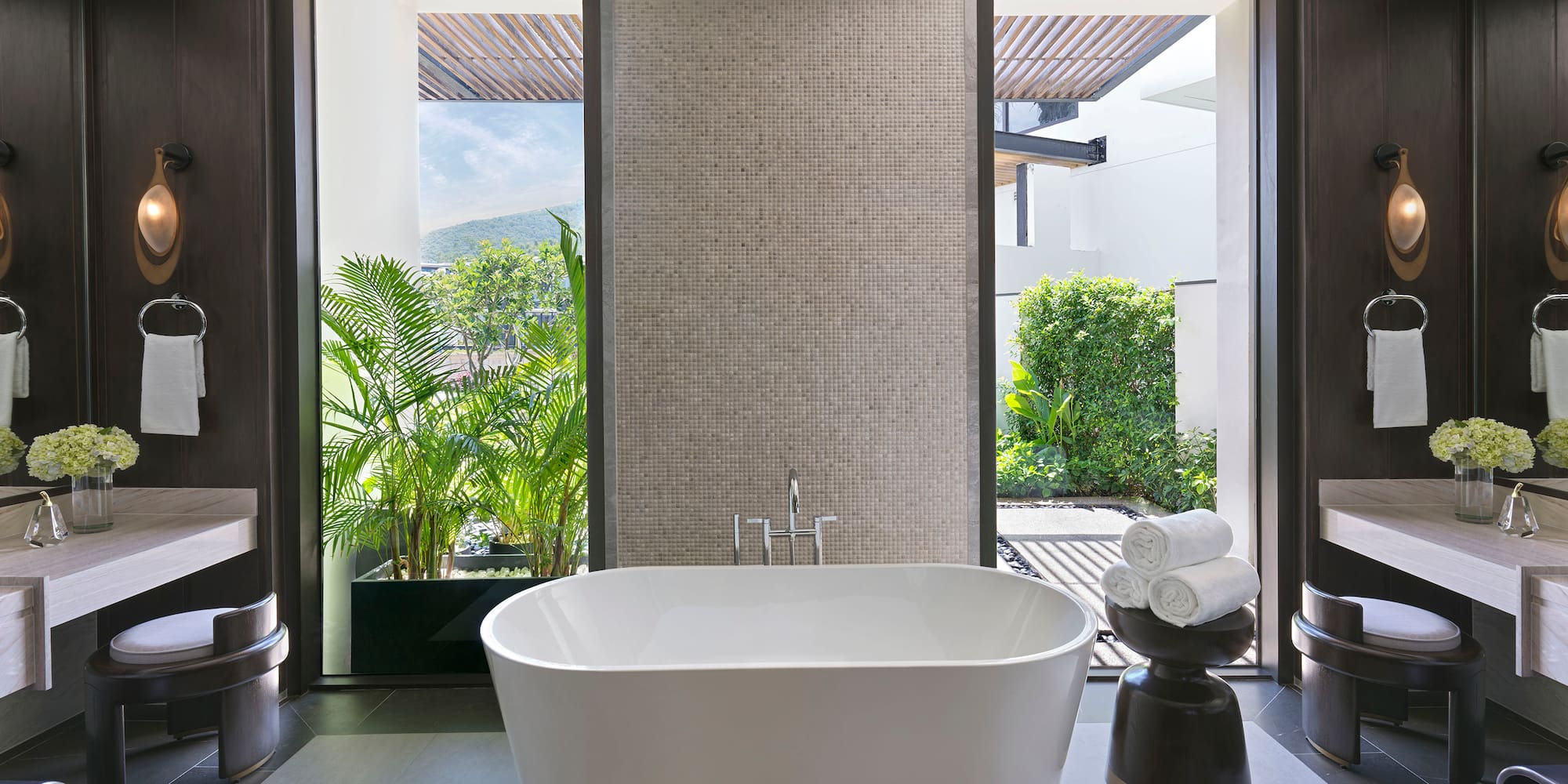 a bathroom with a tub and a sink