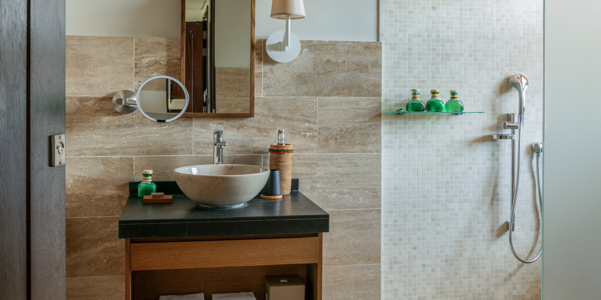 a bathroom with a sink and mirror