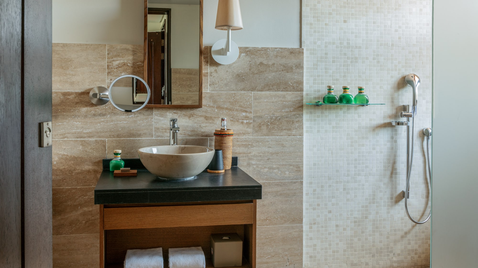 a bathroom with a sink and mirror