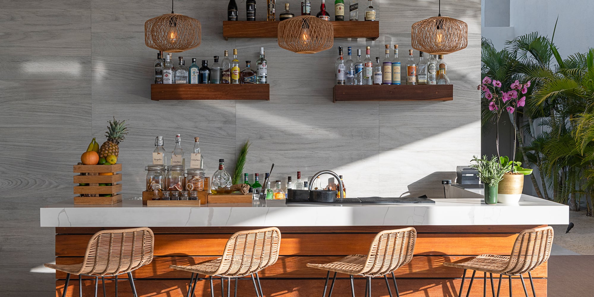 a bar with a counter and stools