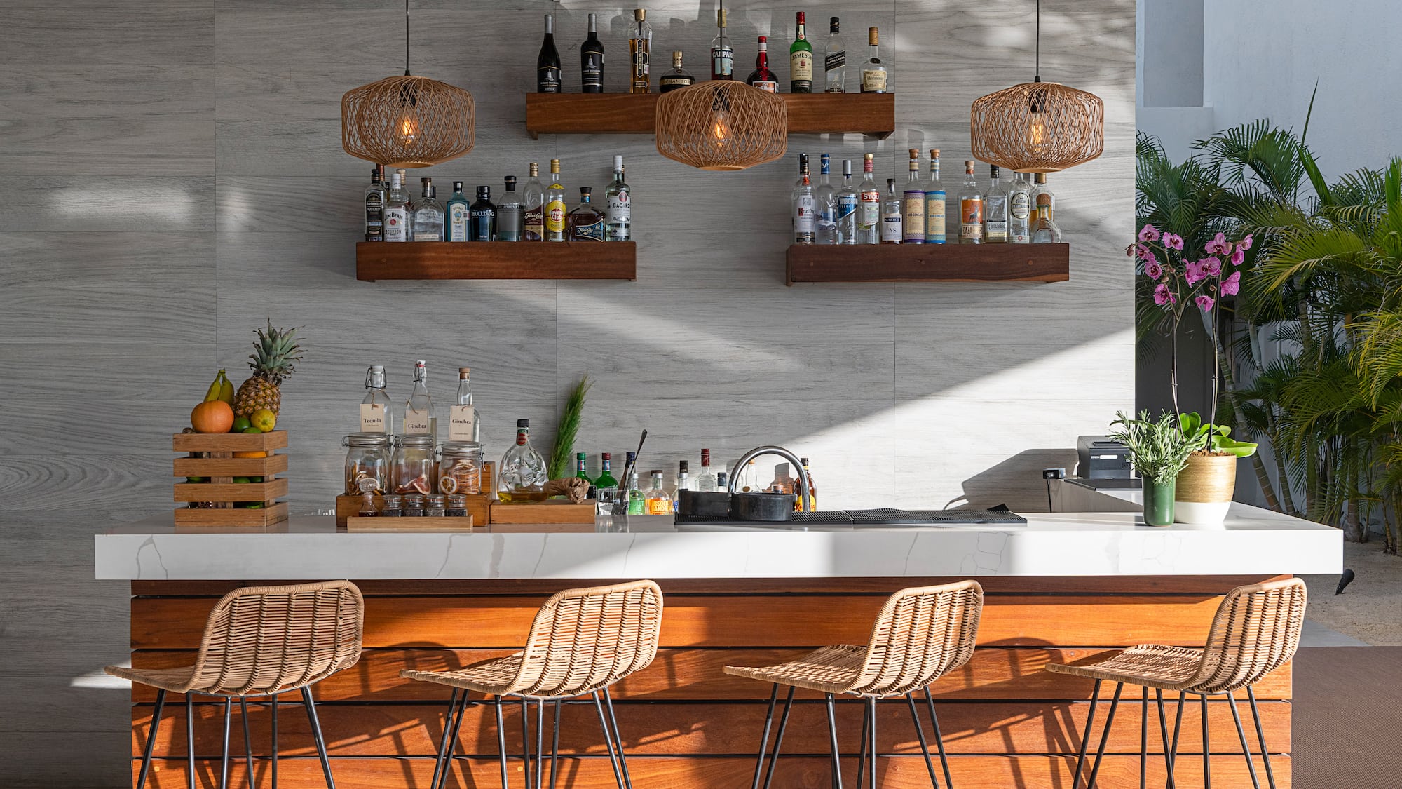 a bar with a counter and stools