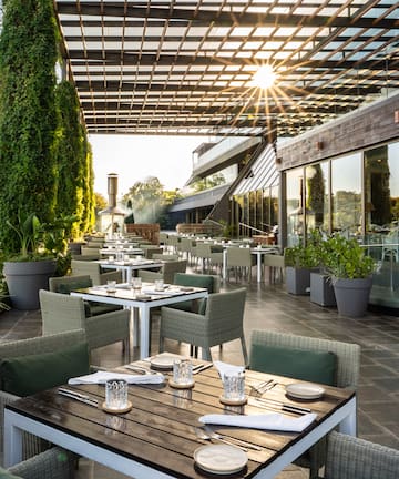 a restaurant with tables and chairs