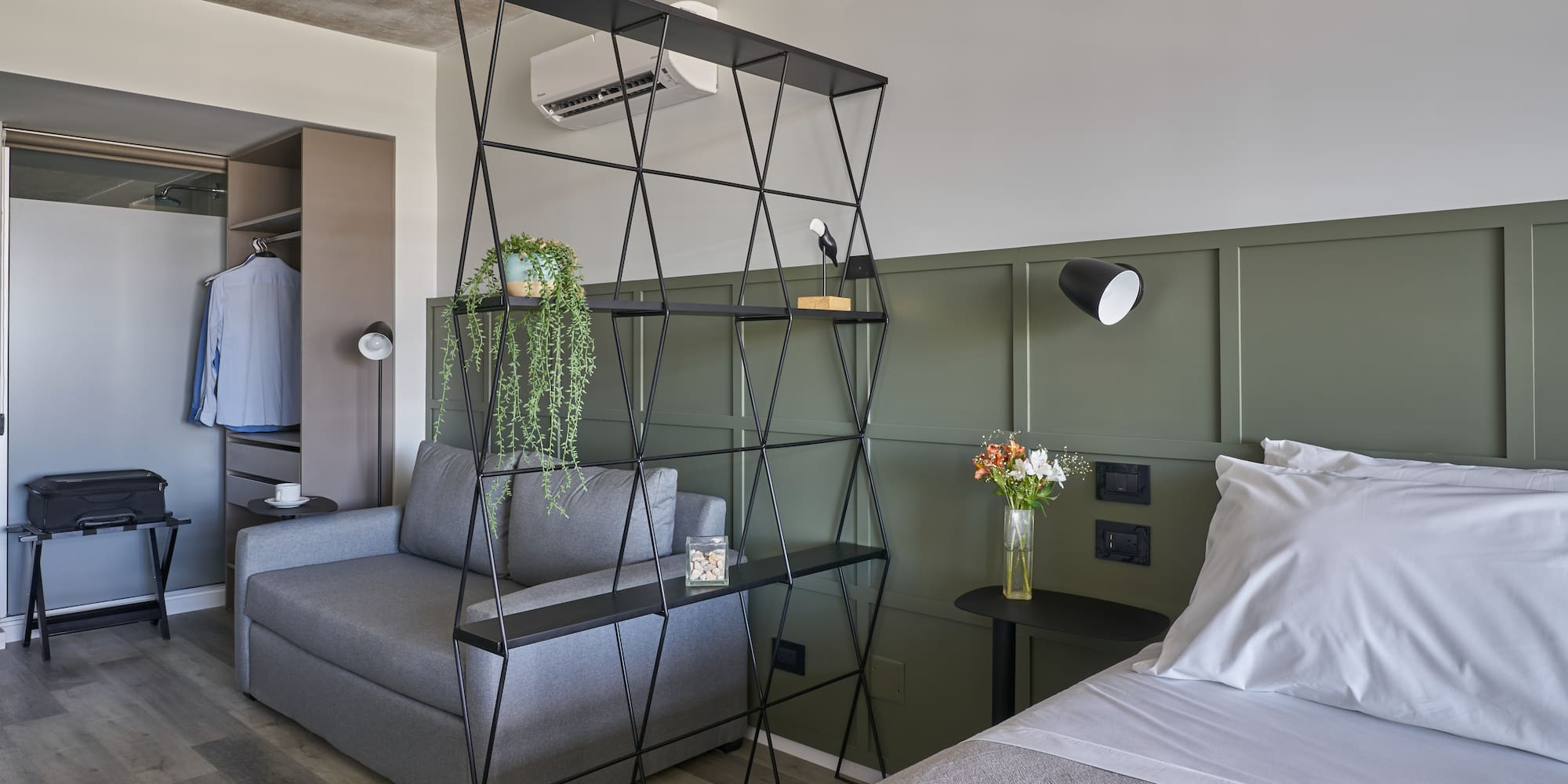 a room with a bed and a couch