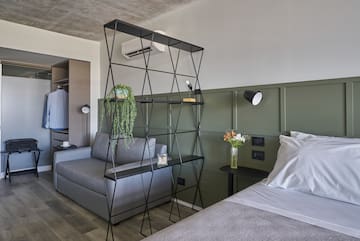 a room with a bed and a couch