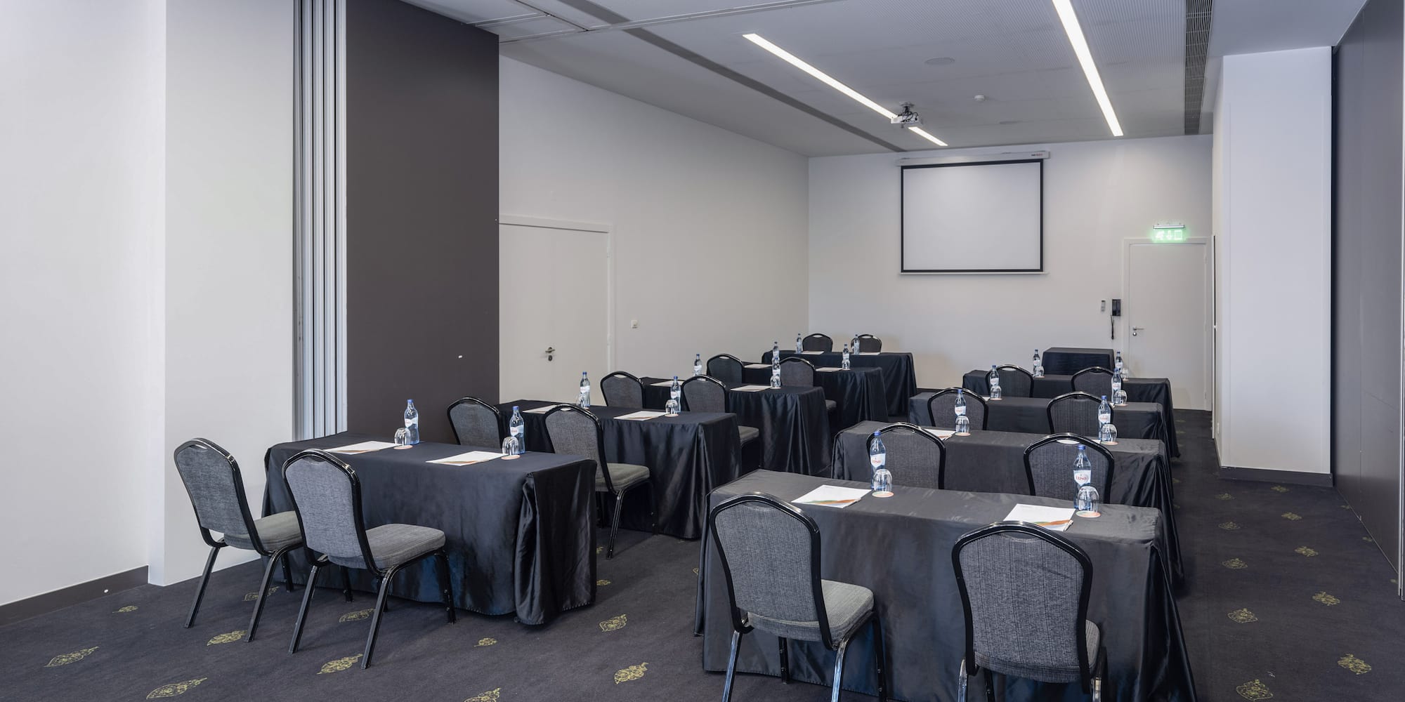 a room with tables and chairs