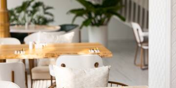 a table with gold utensils and a map on it