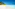 a beach with a hut and trees
