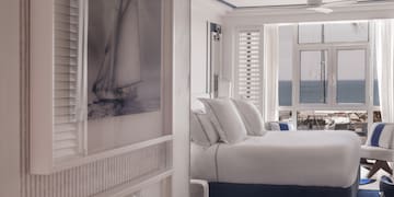 a room with a bed and a window