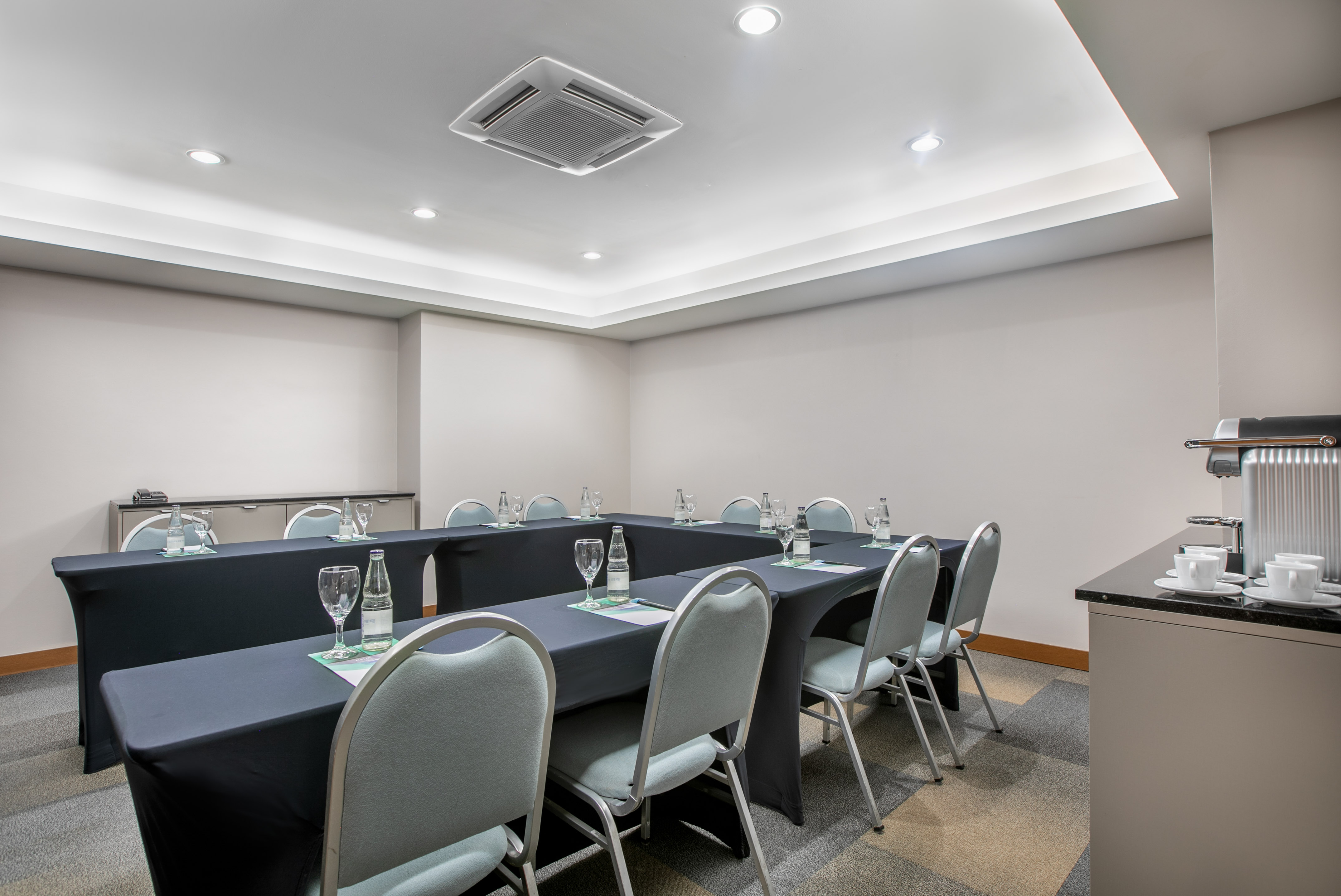 a room with a table and chairs