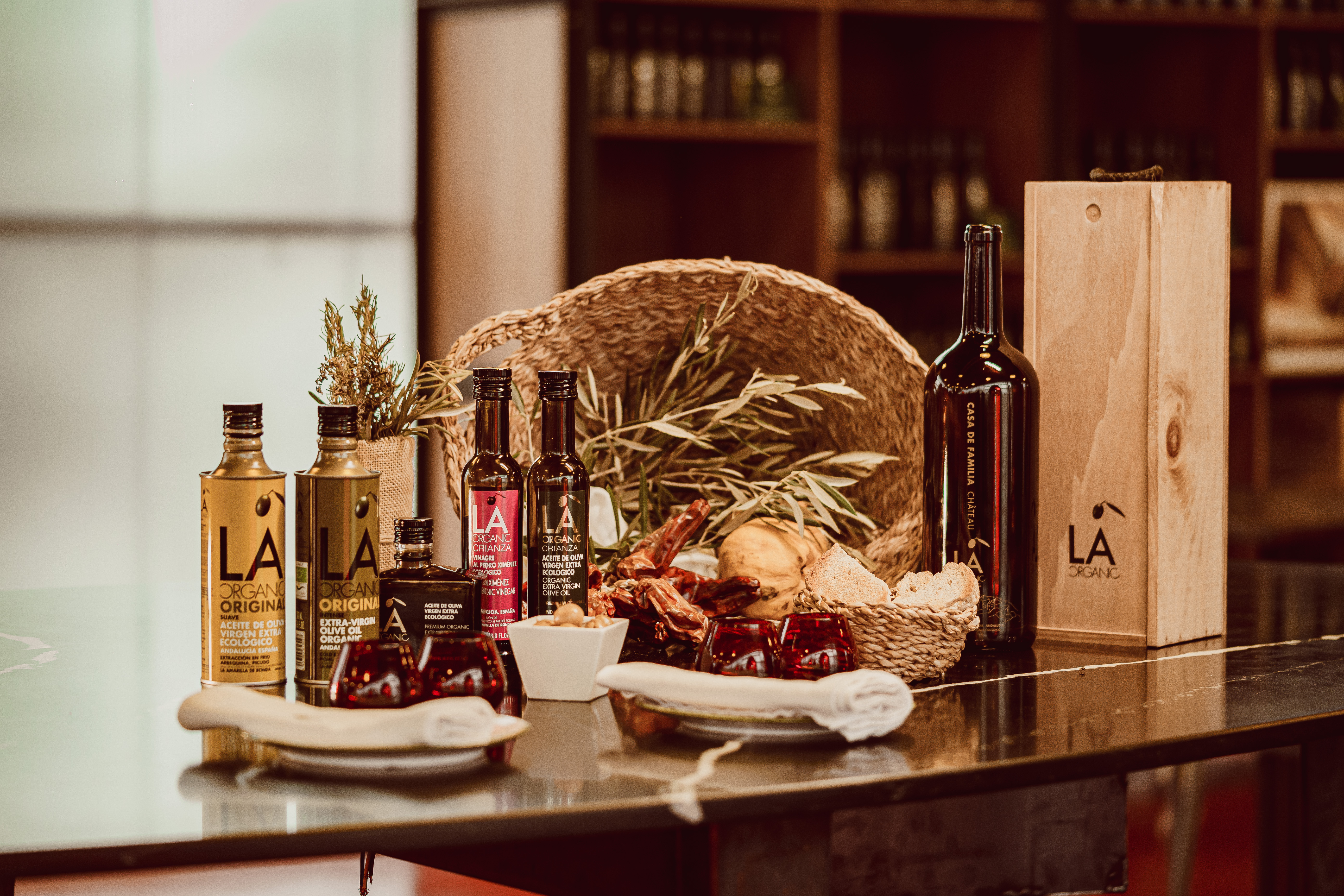 a table with bottles and food on it