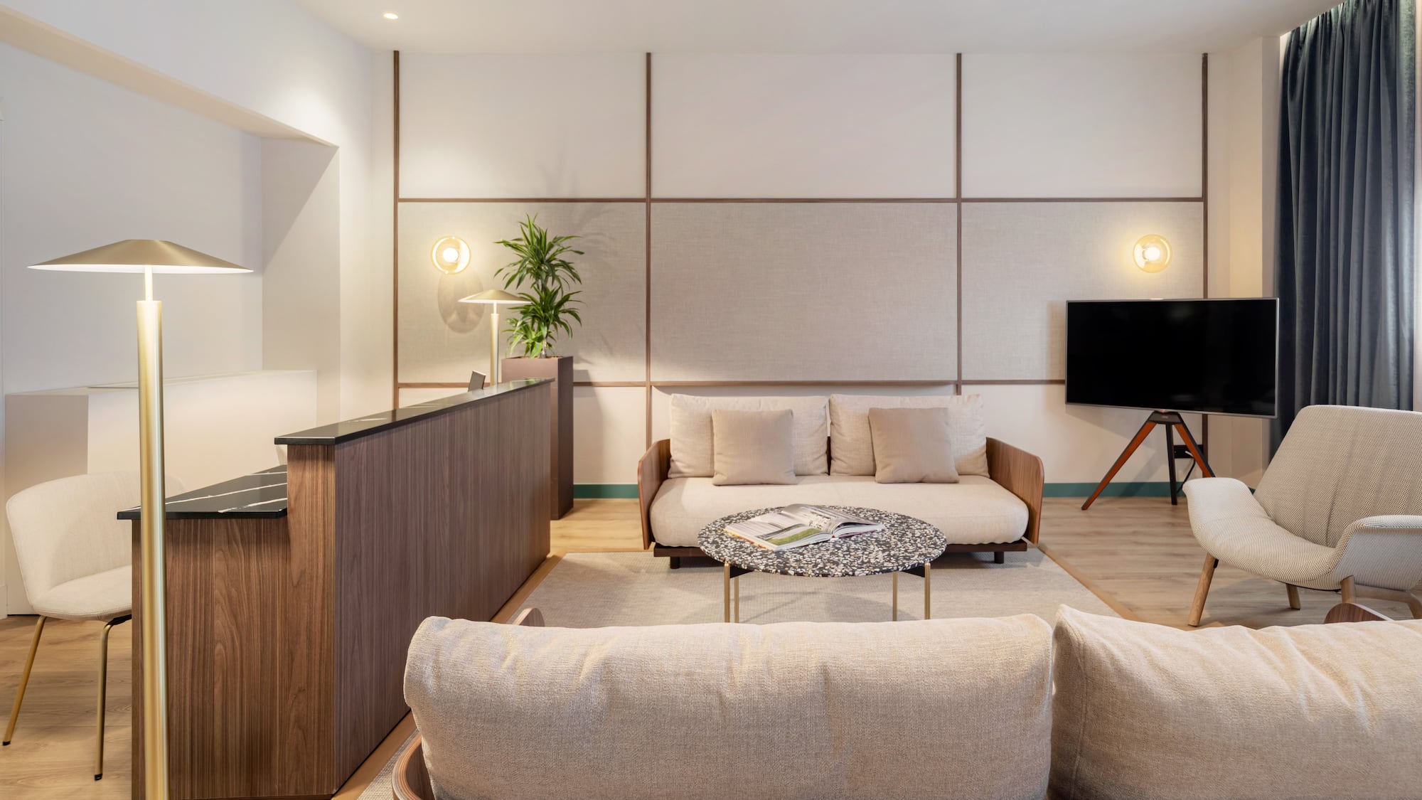 a living room with a couch and a table