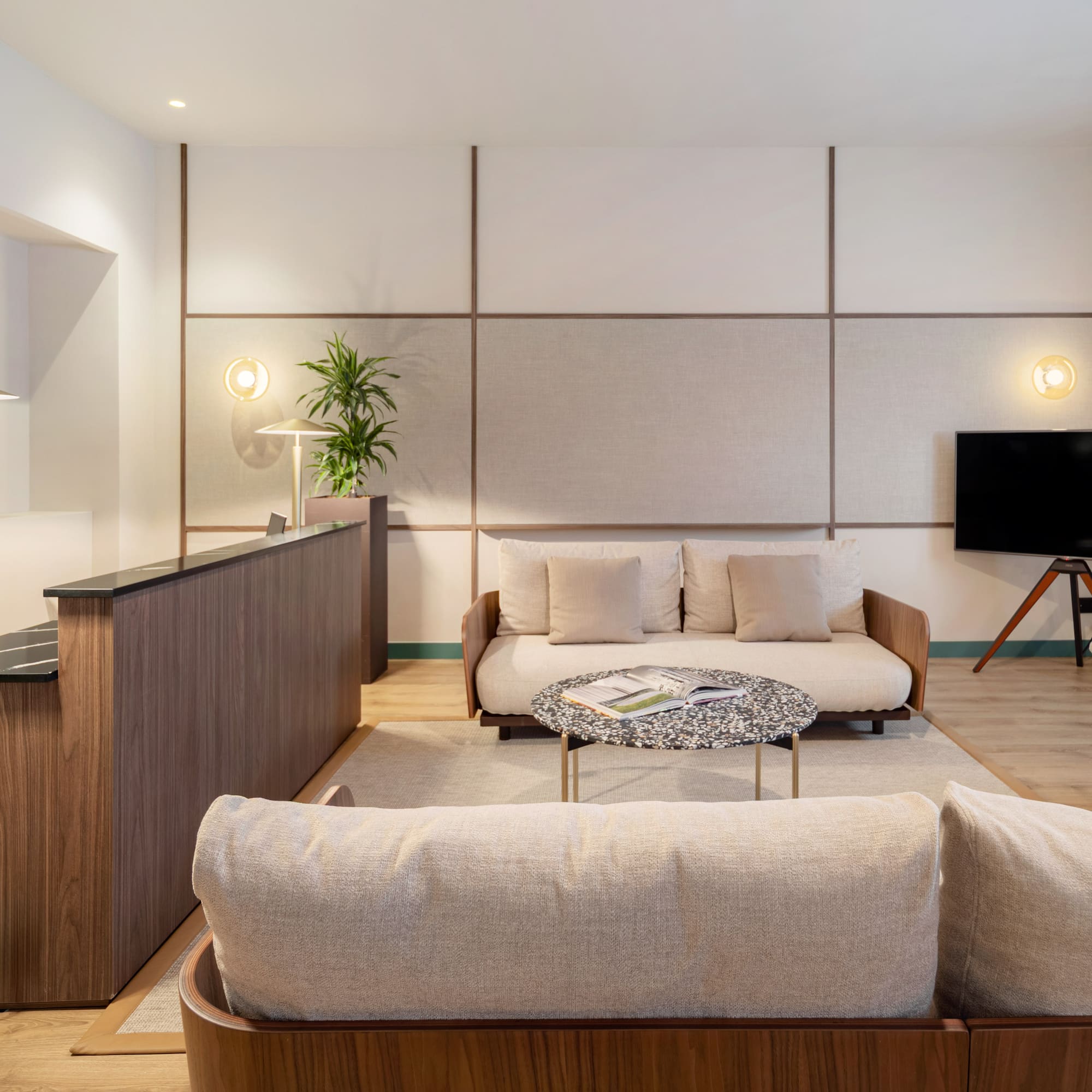 a living room with a couch and a table