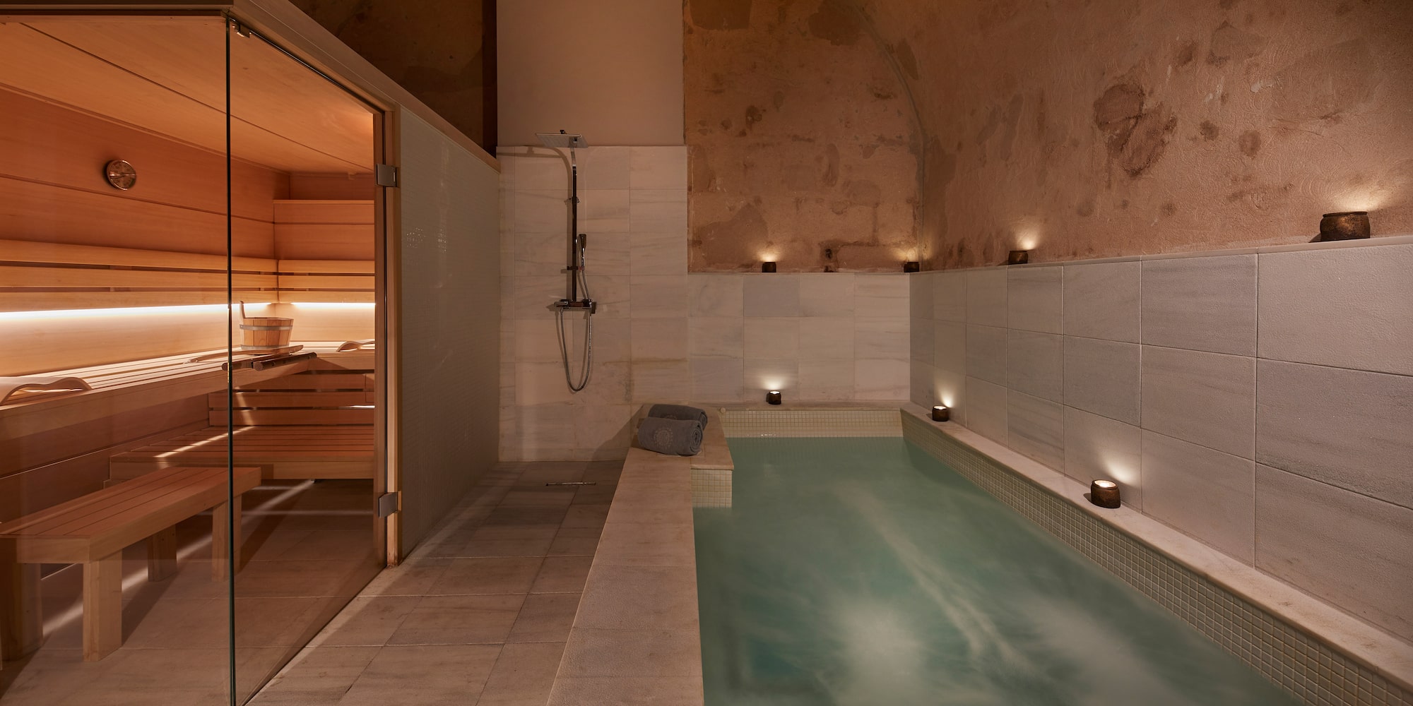 a indoor pool with a wooden door