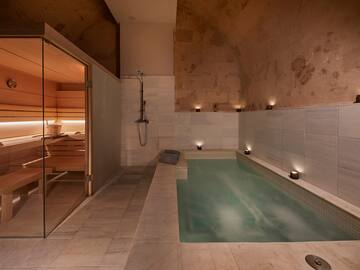 a indoor pool with a wooden door
