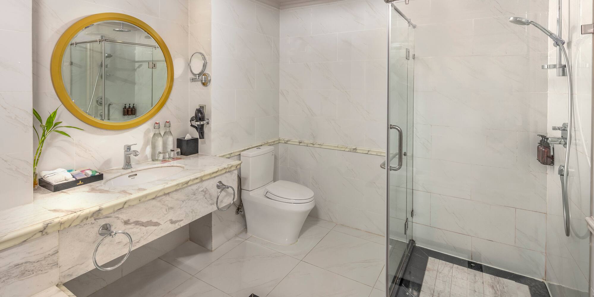 a bathroom with a shower and sink