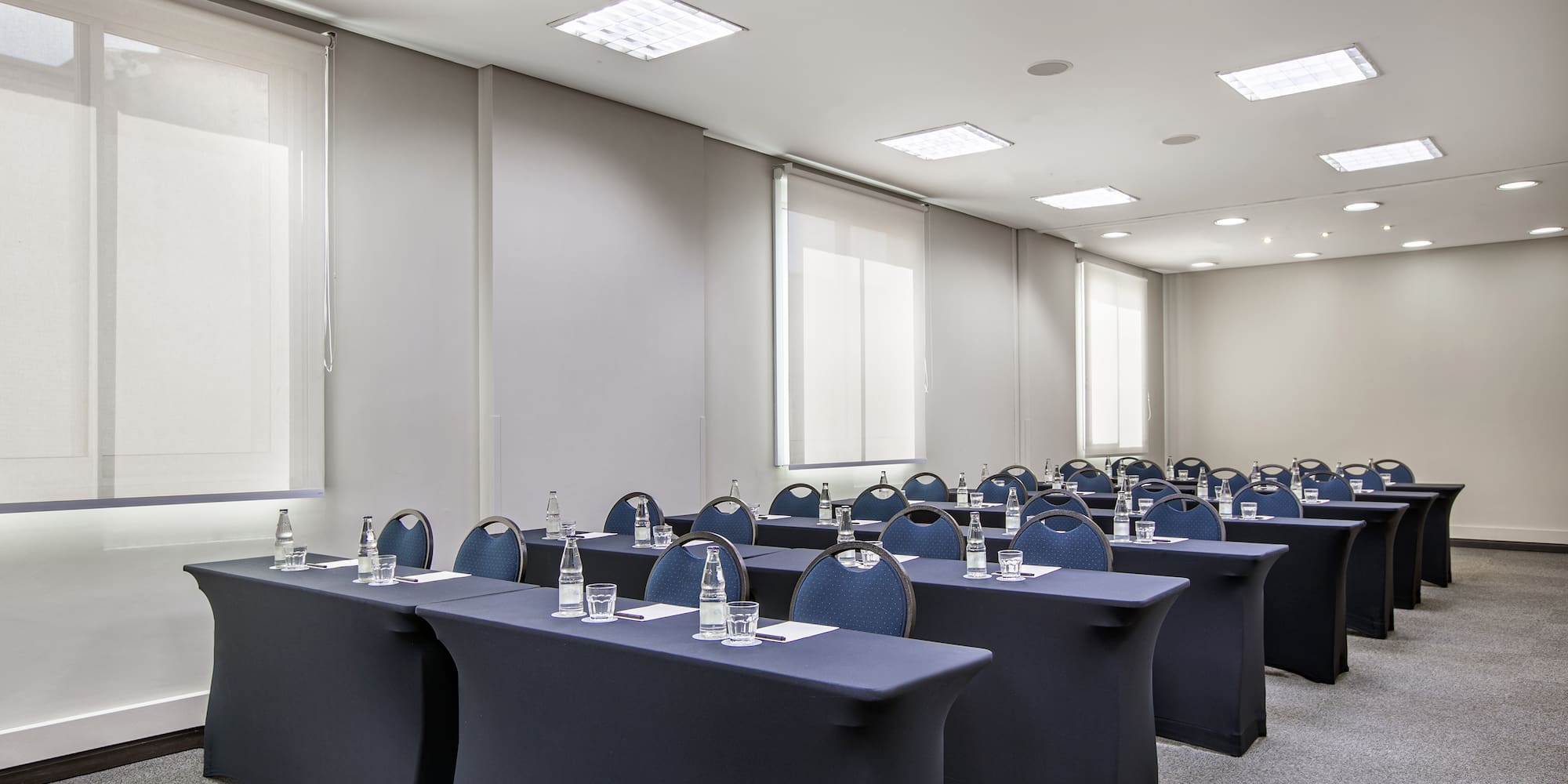 a room with tables and chairs