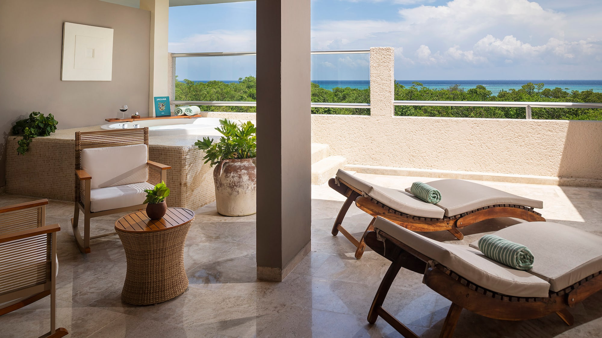 a patio with chairs and a table