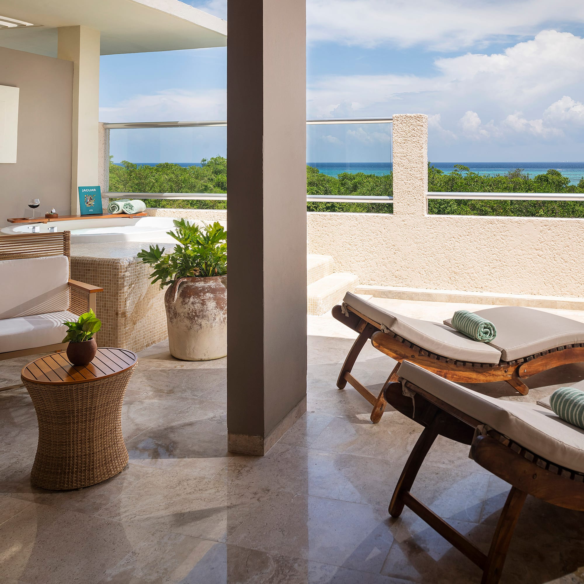 a patio with chairs and a table