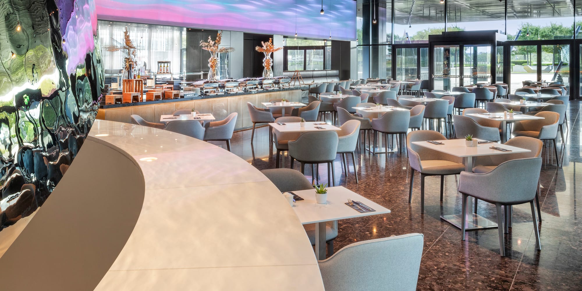 a room with tables and chairs