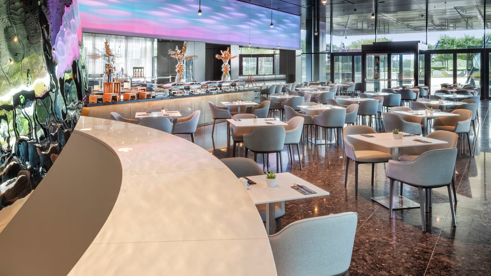 a room with tables and chairs