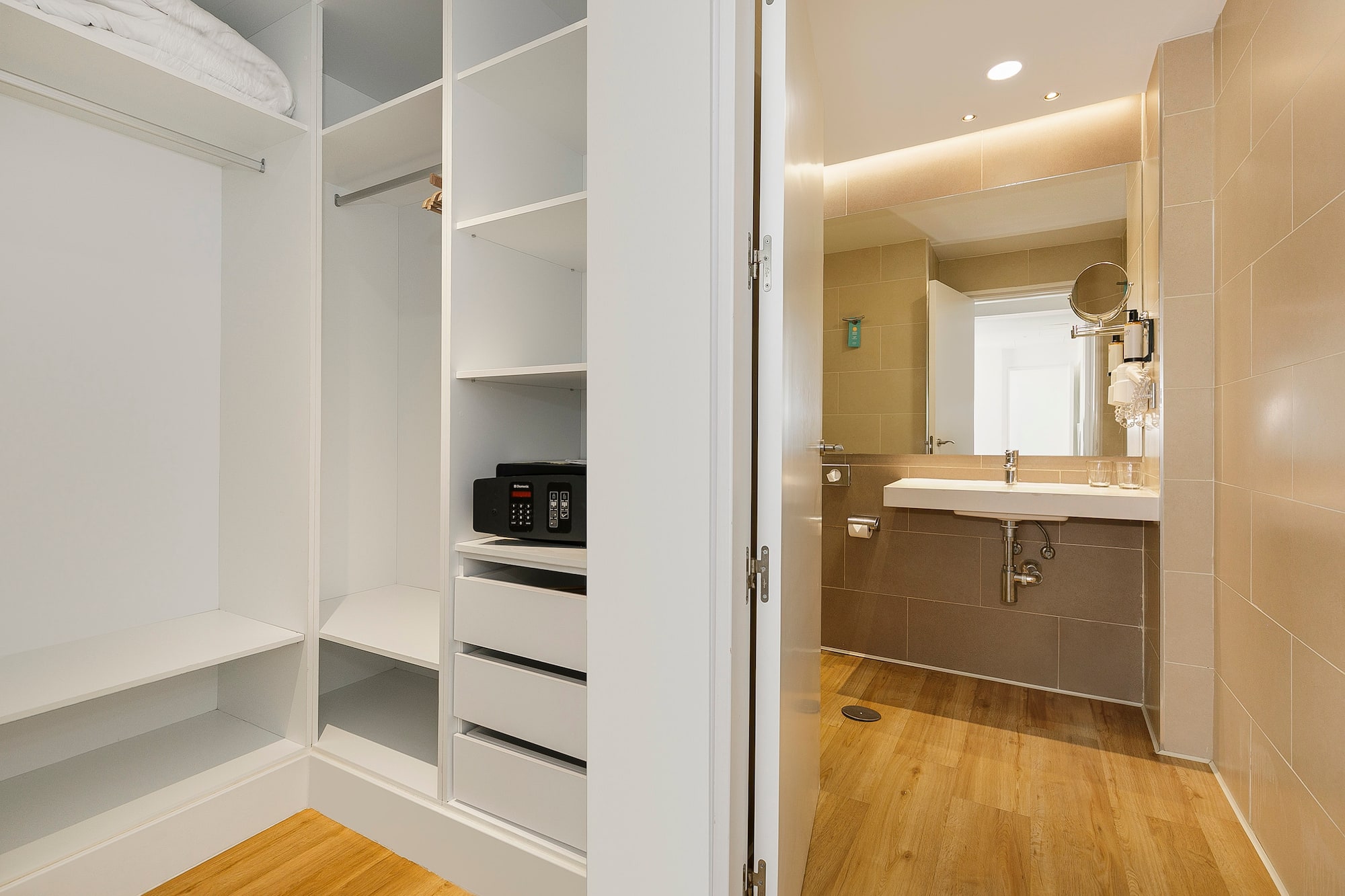 a room with a closet and sink