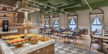 a room with tables and chairs