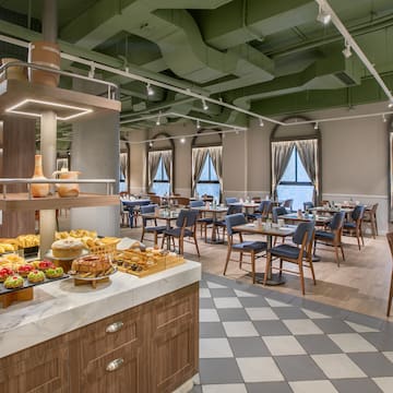 a room with tables and chairs