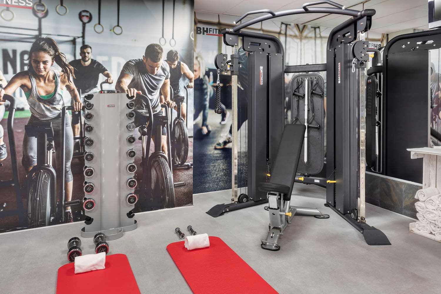 a gym with weights and exercise equipment