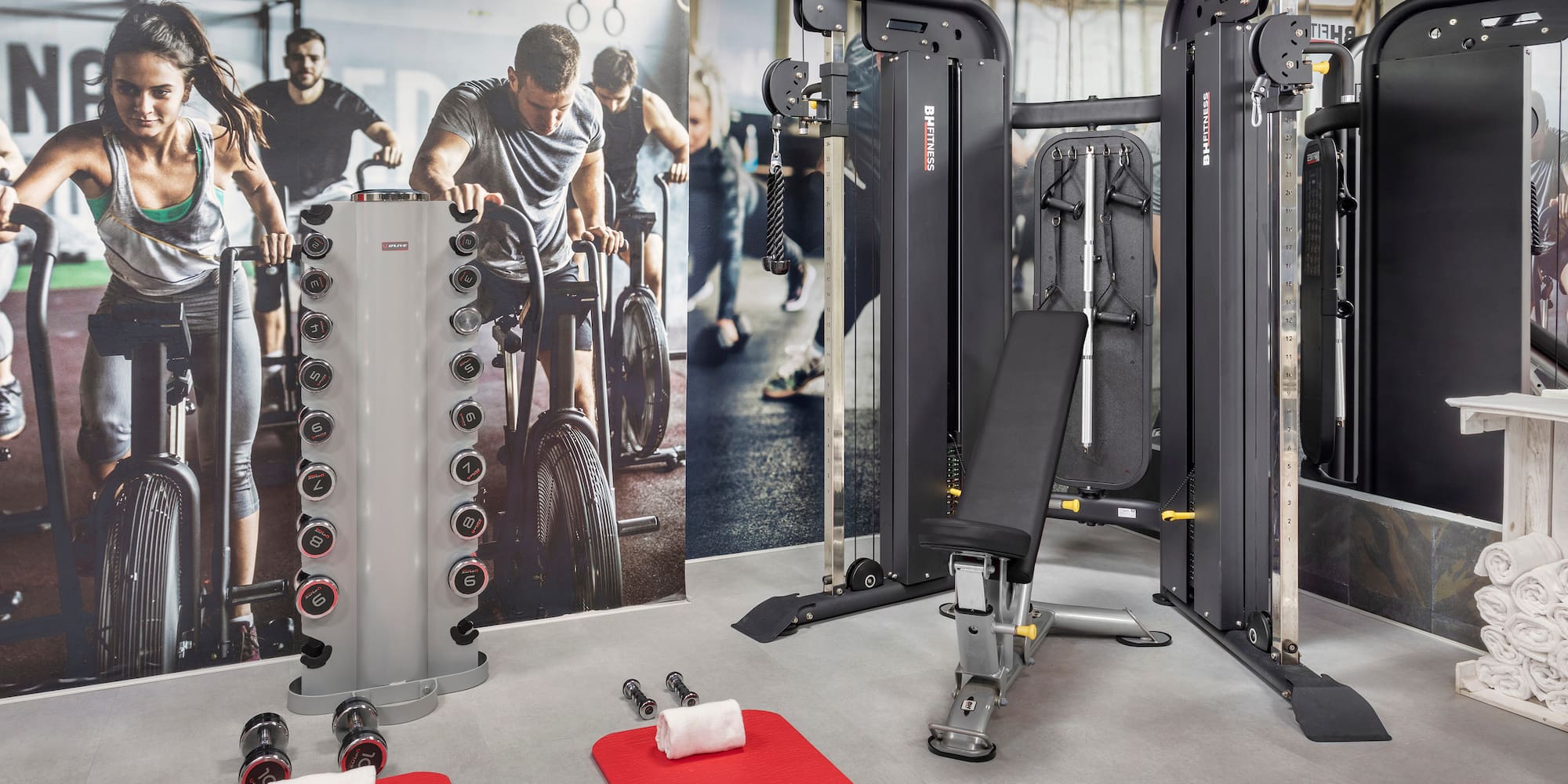 a gym with weights and exercise equipment