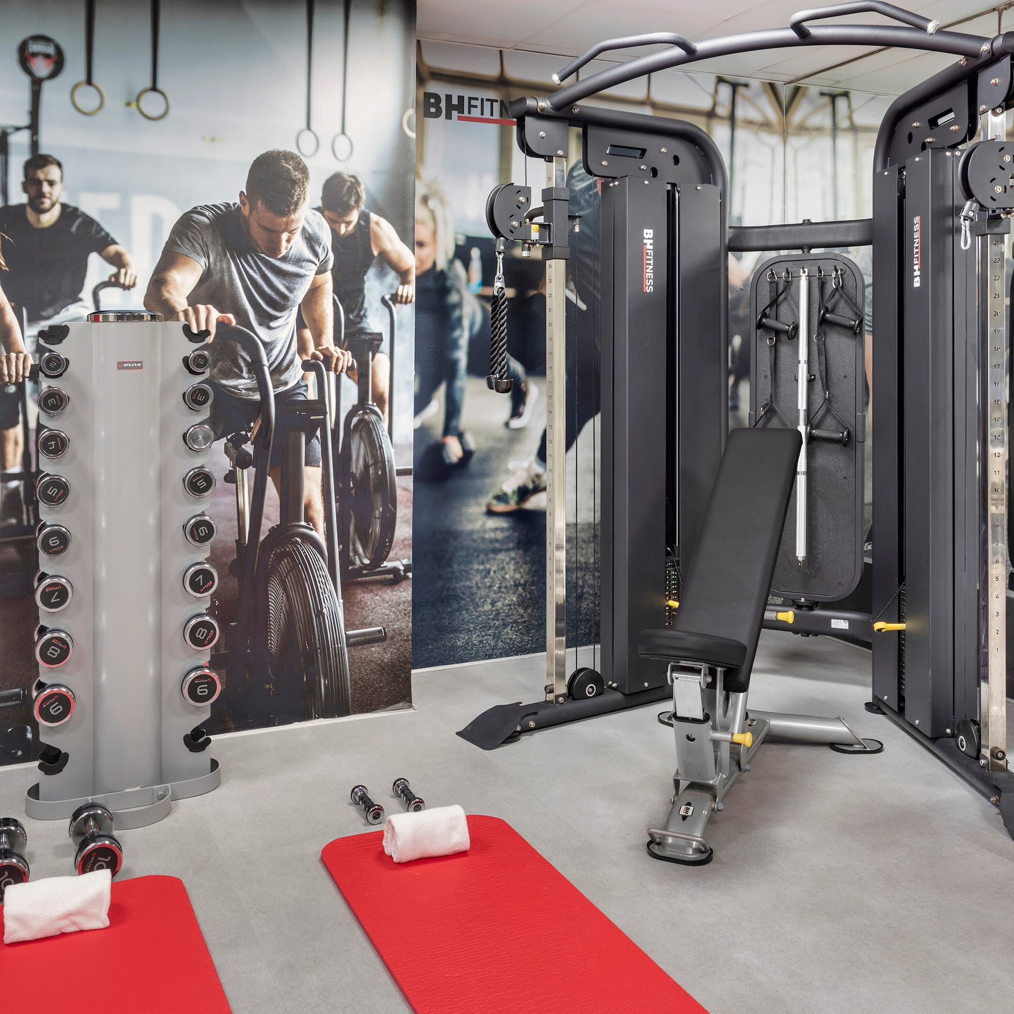 a gym with weights and exercise equipment