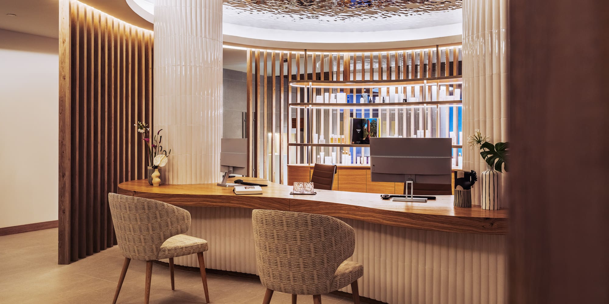 a desk with chairs in a room