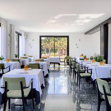 a room with tables and chairs