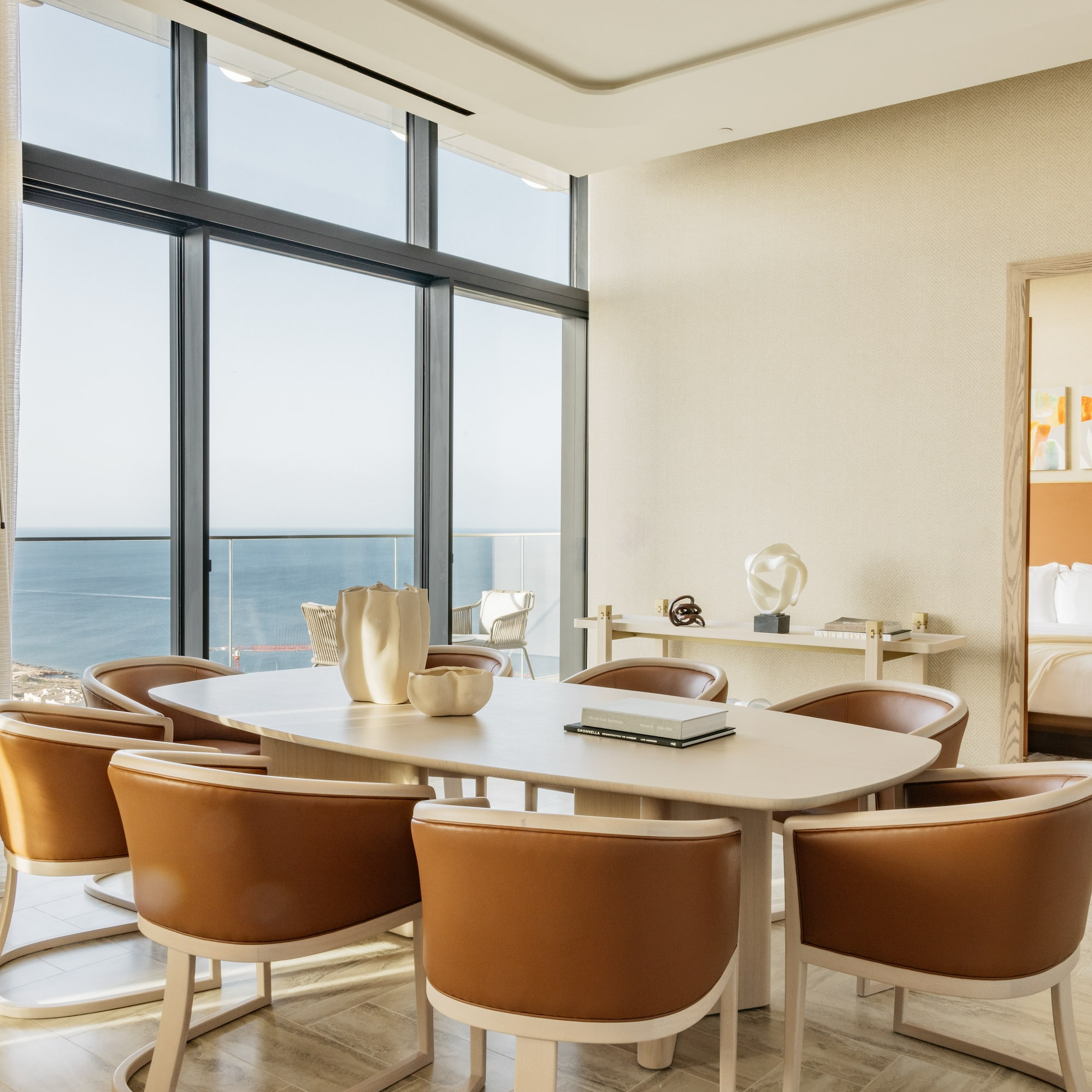 a room with a table and chairs