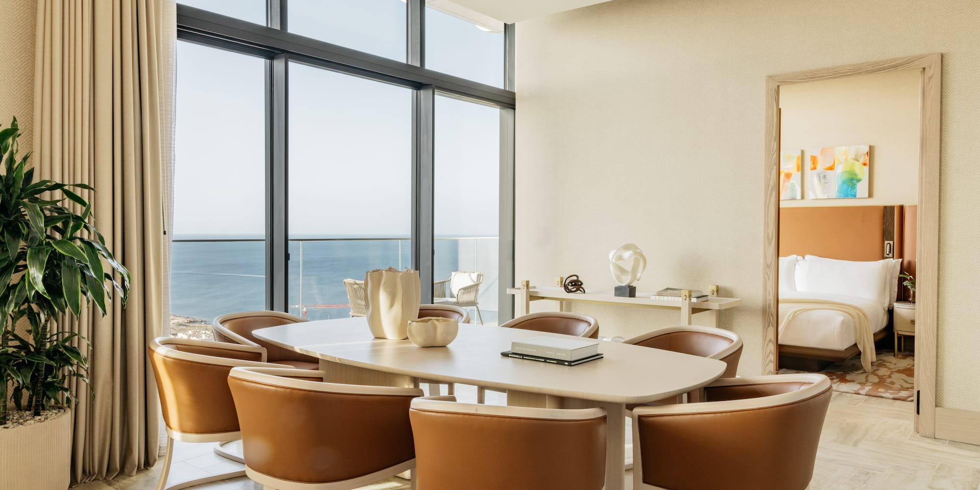 a room with a table and chairs