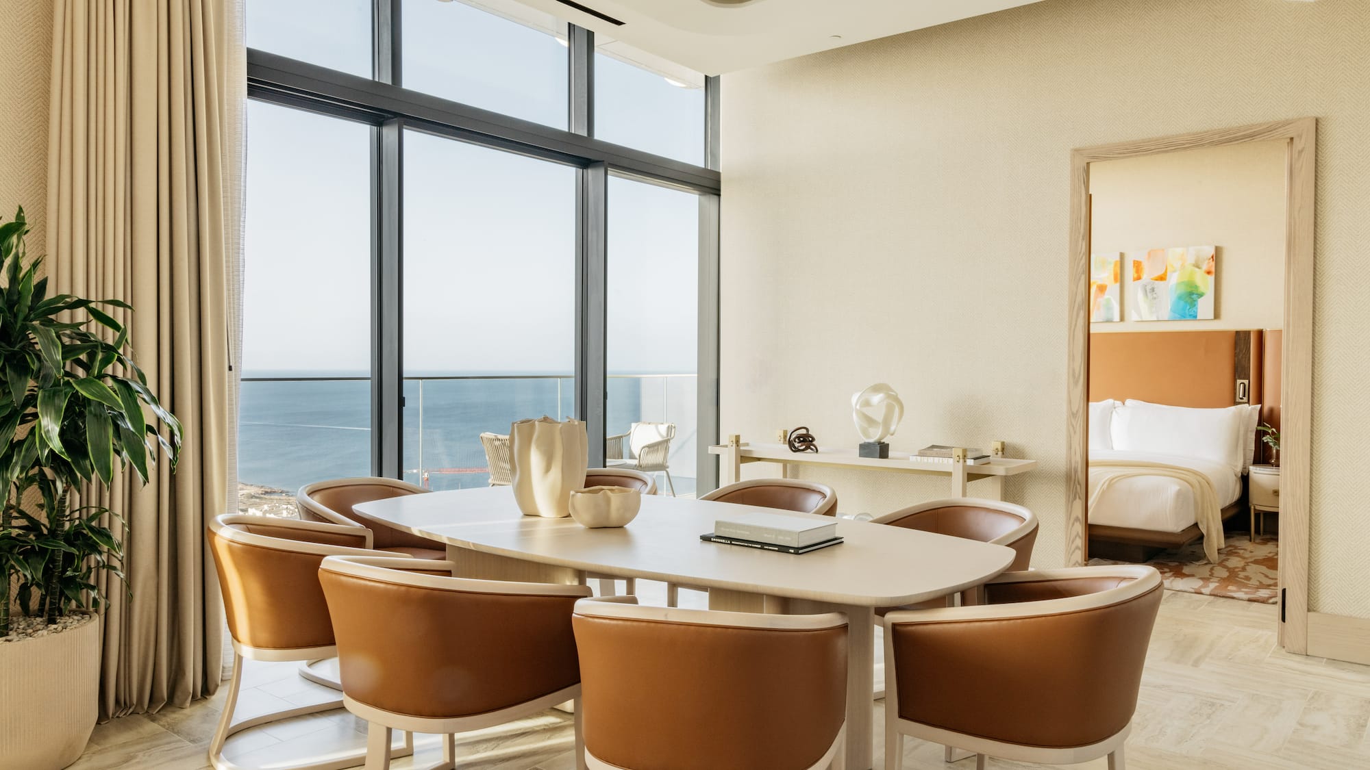 a room with a table and chairs