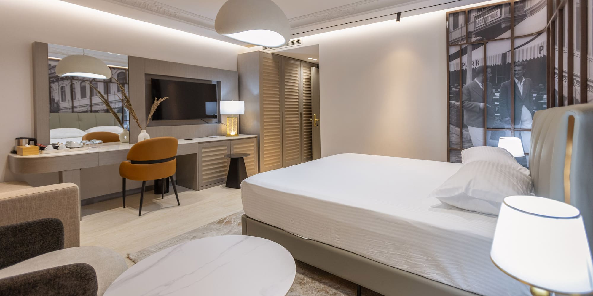 a room with a bed and a desk