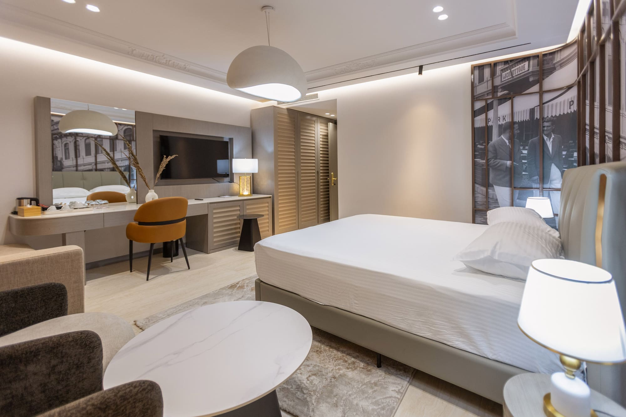 a room with a bed and a desk