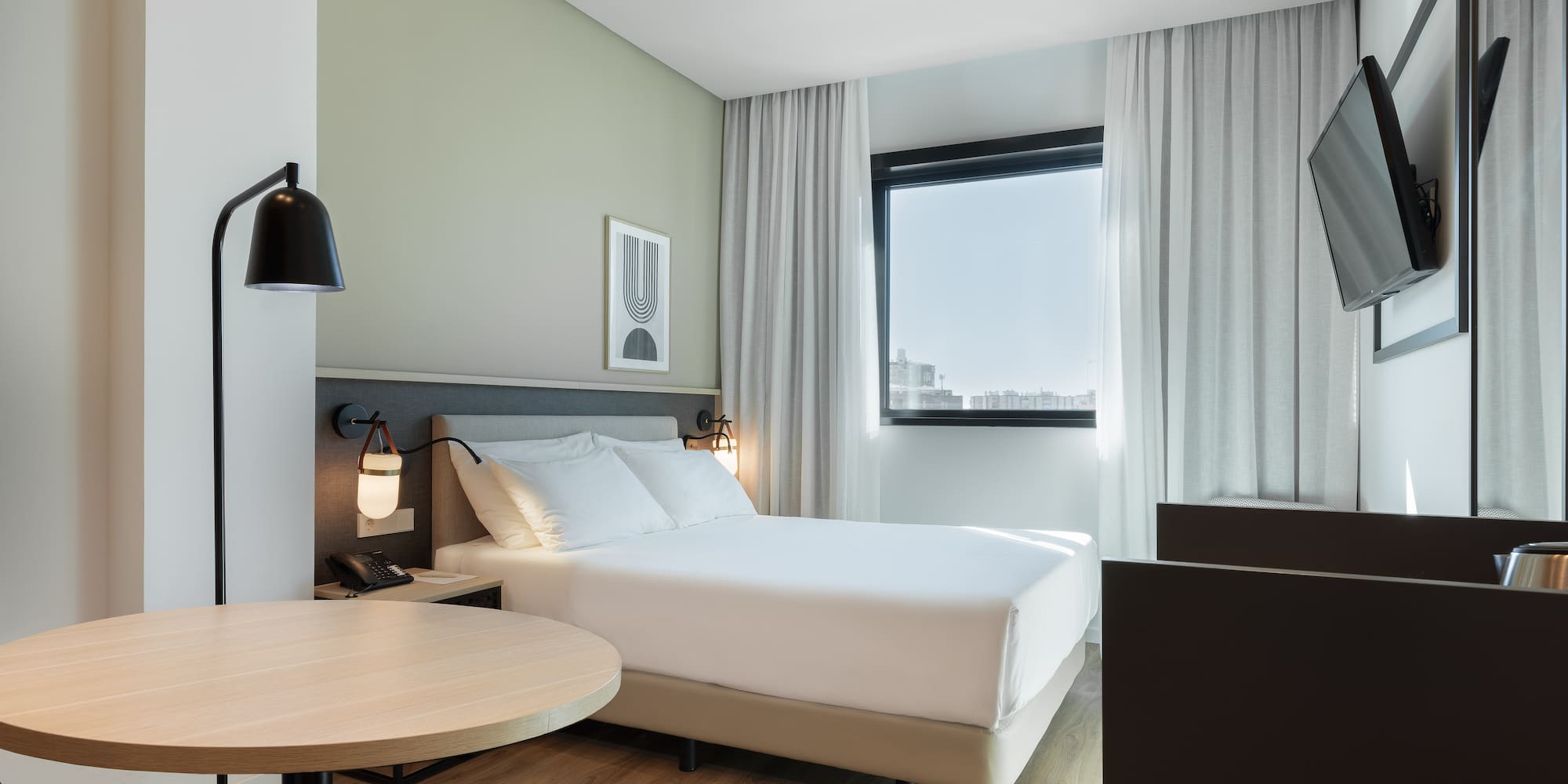 a room with a bed and a table