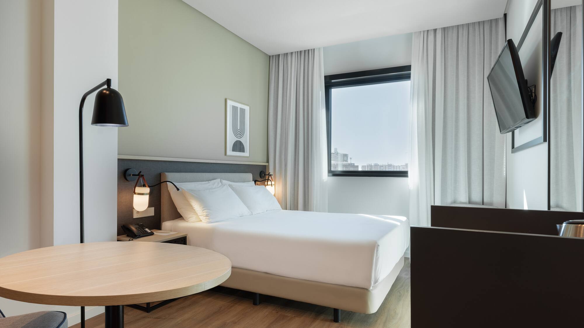 a room with a bed and a table