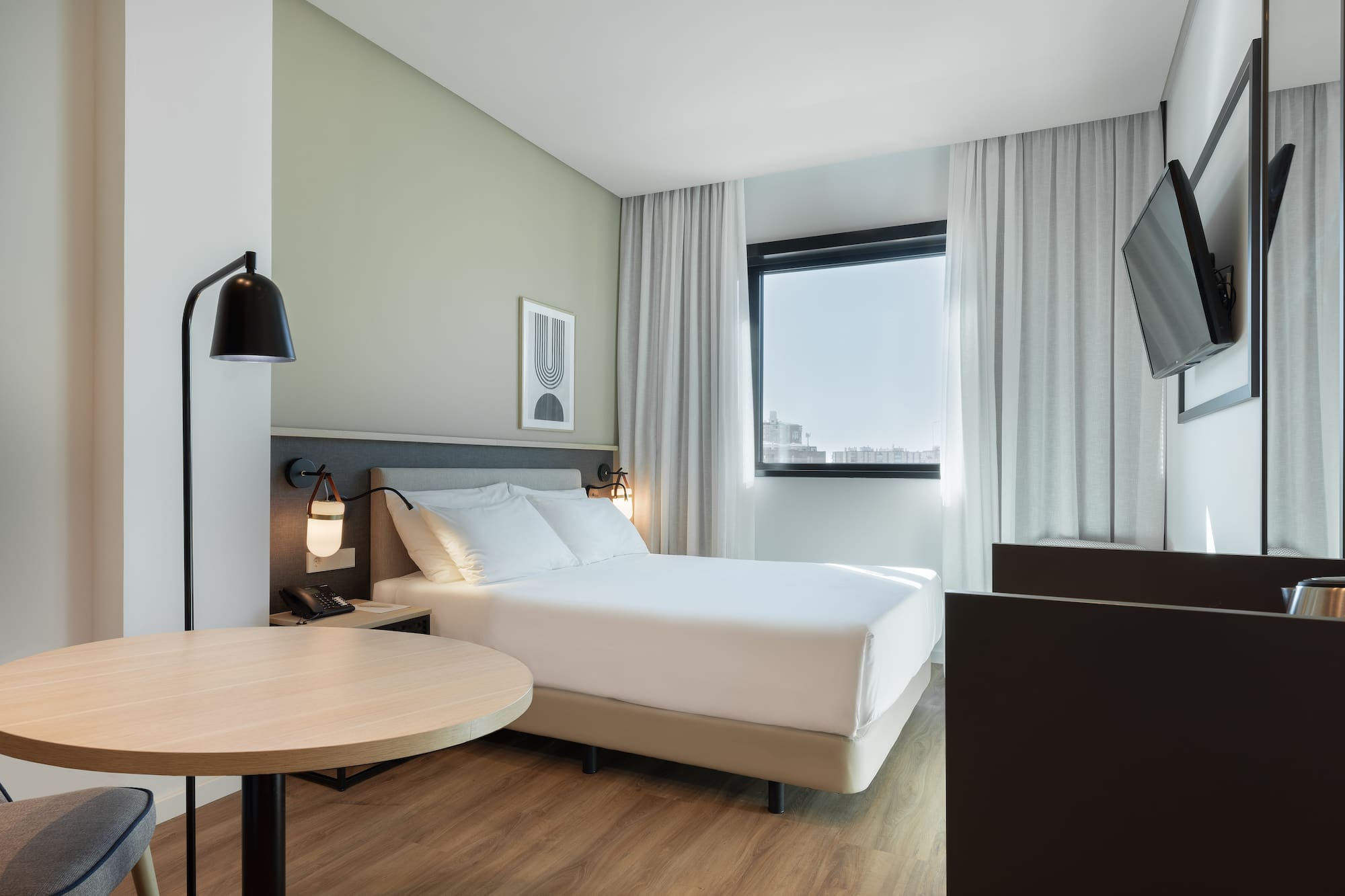 a room with a bed and a table