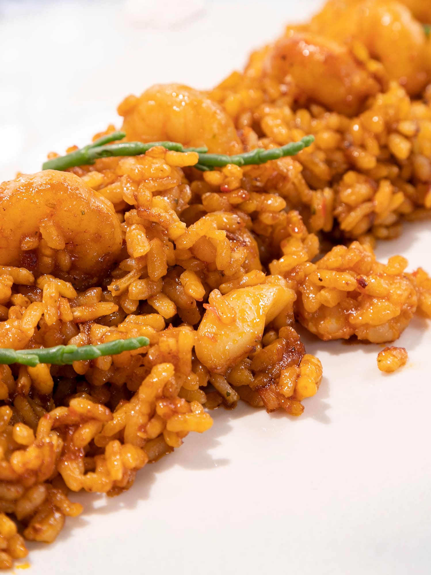 a plate of food on a white surface
