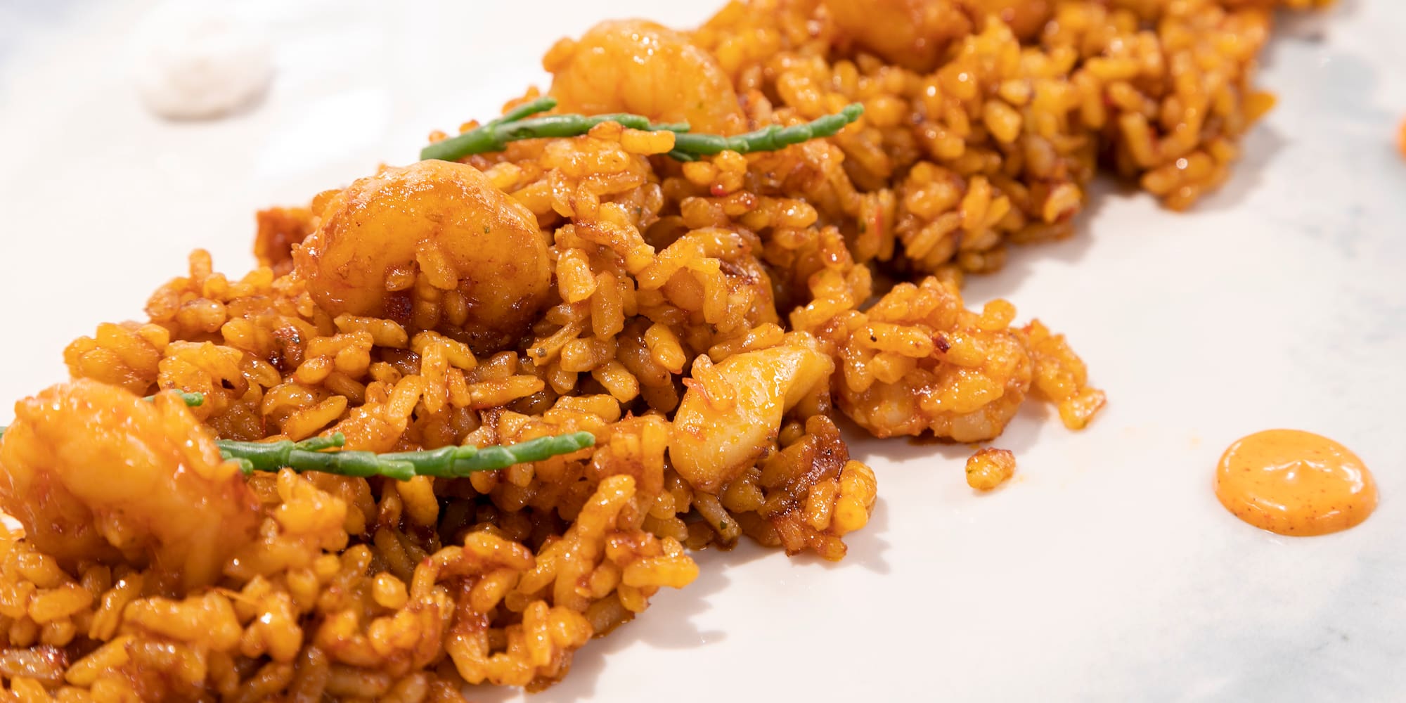 a plate of food on a white surface