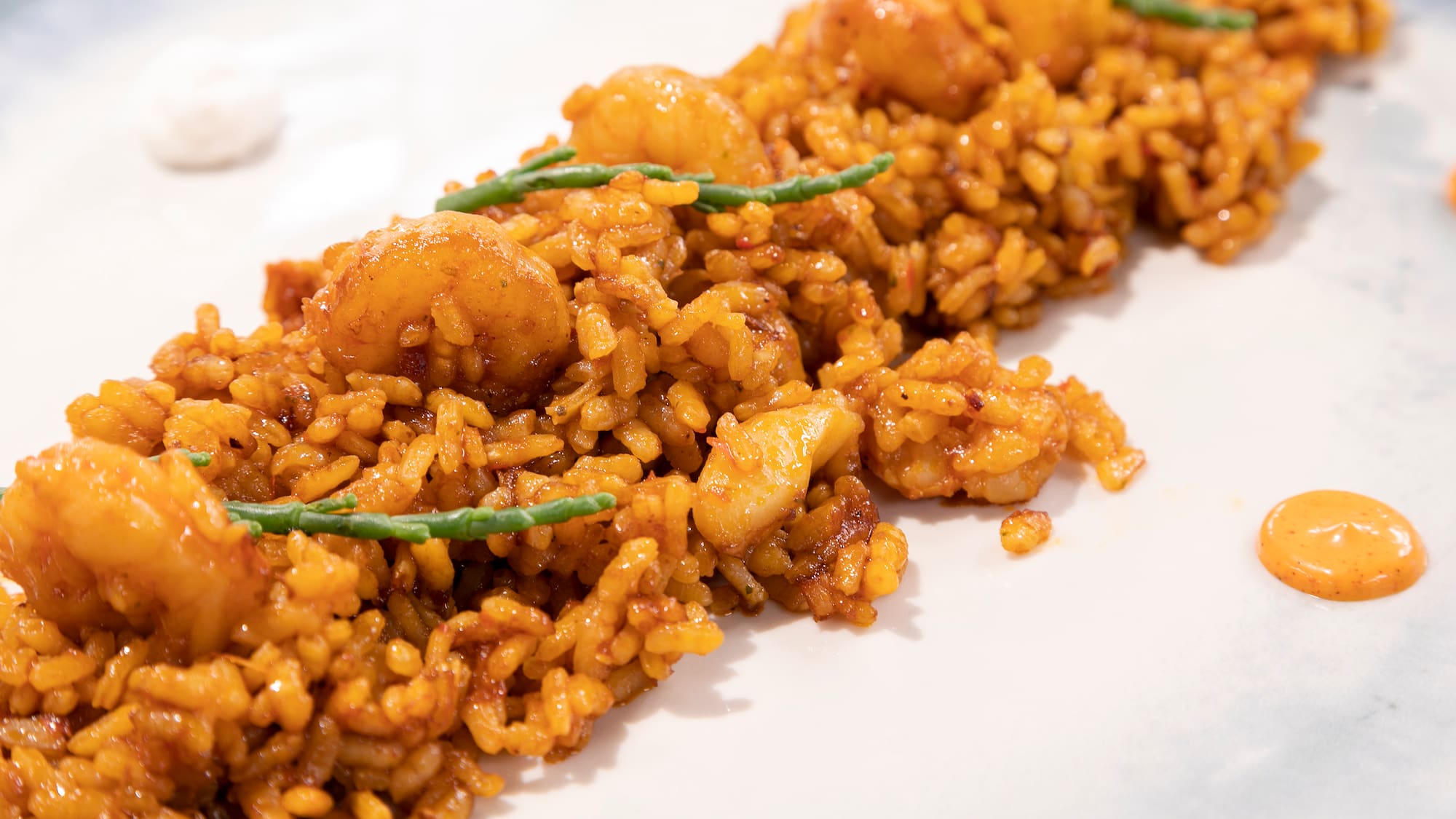a plate of food on a white surface