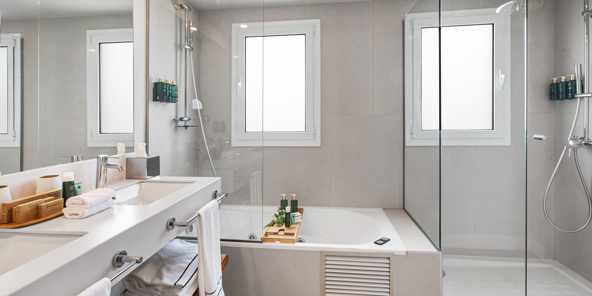 a bathroom with a bathtub and shower