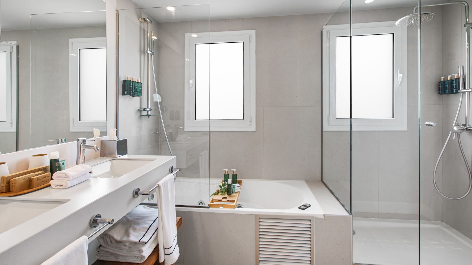 a bathroom with a bathtub and shower