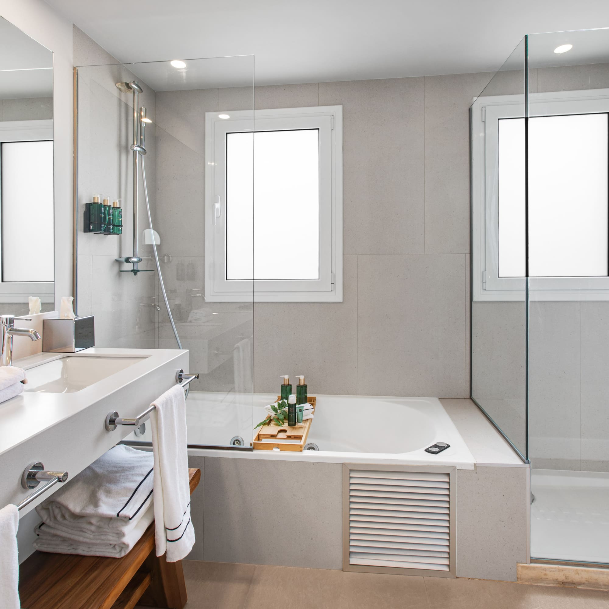 a bathroom with a bathtub and shower