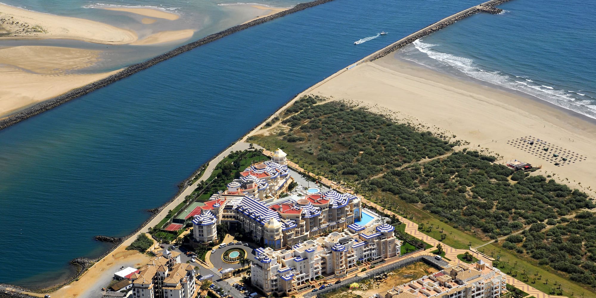 a aerial view of a beach and a city